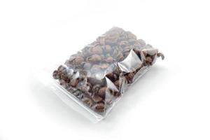 chocolate cereal for breakfast packaged in plastic photo