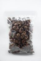 chocolate cereal for breakfast packaged in plastic photo