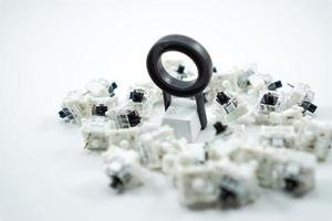 keycap puller with mechanical keyboard keycaps and black mechanical switch keys photo