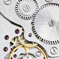 background from steel movement of retro watch photo
