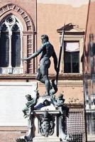 view on Fountain of Neptune in Bologna photo