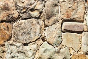 outdoor wall from natural boulders photo