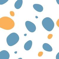 Abstract polka dot seamless vector pattern in yellow and blue