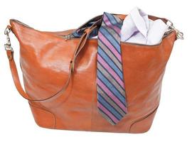 male leather handbag with shirt and tie isolated photo