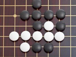 top view of stones during go game playing photo