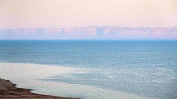 pink sunrise over Dead Sea in winter photo