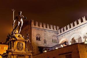 Fountain of Neptune in Bologna at night photo