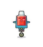 The cute toothpaste character is riding a circus bike vector