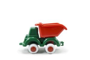 green paint plastic toy mining truck isolated on white photo