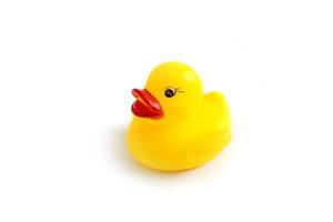 Yellow rubber duck toddler toy used to play in the bath photo