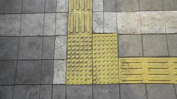 Braille Blocks are plates that are placed on pedestrians to safely guide photo