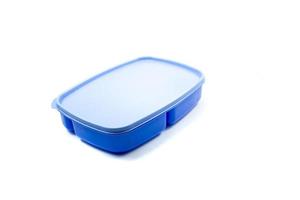 blue plastic lunch box isolated on white background. photo