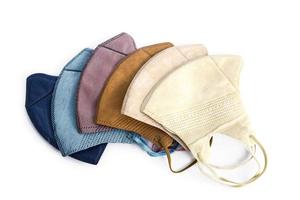 multi-color non-medical mask set with 3 layers isolated on white photo