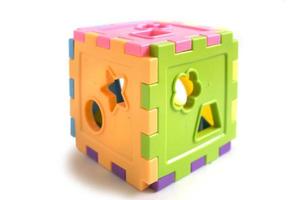 children's toy cube puzzle to recognize shapes, educational toys. photo