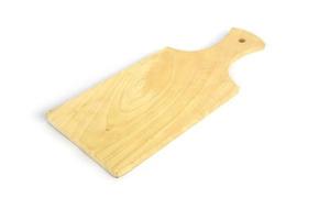 Wooden cutting board isolated on a white background photo