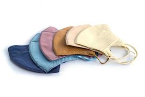 multi-color non-medical mask set with 3 layers isolated on white photo