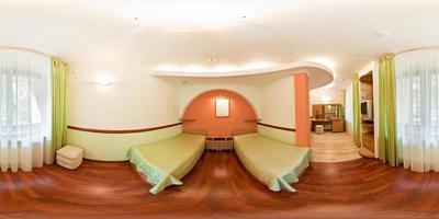 seamless 360 panorama in interior of bedroom of cheap hostel,  flat or apartments with chairs and table in equirectangular projection with zenith and nadir. VR AR content photo