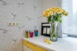 vase with a bouquet of flowers in the interior photo