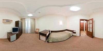 seamless 360 panorama in interior of bedroom of cheap hostel,  flat or apartments with chairs and table in equirectangular projection with zenith and nadir. VR AR content photo