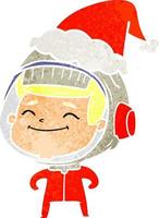 happy retro cartoon of a astronaut wearing santa hat vector