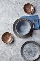 Food background. Empty plates on grey background. Top view, flatlay, copyspace photo