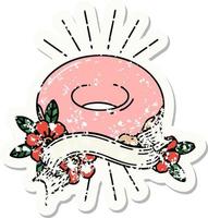 worn old sticker of a tattoo style iced donut vector