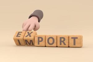 Hand turns dice and changes the word import to export. photo