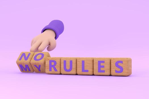 Hand turns dice and changes the expression  no rules  to my rules. photo