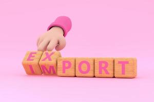 Hand turns dice and changes the word import to export. photo