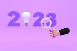 light bulb and magnifying glass. finding or searching ideas concept on new year. photo