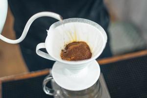 Drip coffee,Close up of hand brewing coffee photo