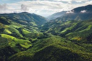 Green mountain valley nan thailand,green mountain fields with blue sky photo