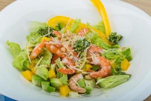 Salad with shrimps and avocado photo