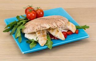 Pita with ruccola and chicken photo