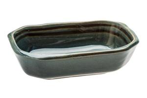 Empty ceramic bowl on white background photo