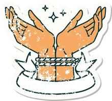 worn old sticker with banner of a pair of tied hands vector