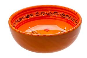 Red bowl on white background photo