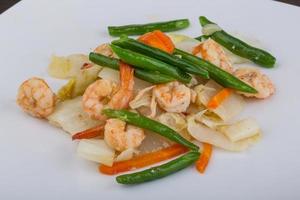 Shrimp salad on the plate photo