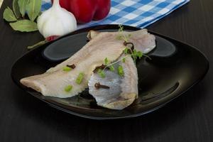 Herring fillet on the plate photo