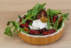 Salad with dried tomato photo