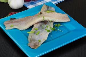 Herring fillet on the plate photo