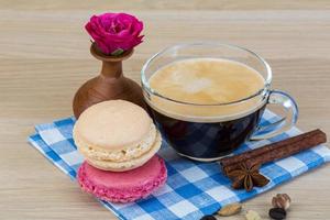 Macaroon delicious on wooden background photo