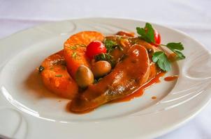 Beef tongue on the plate photo