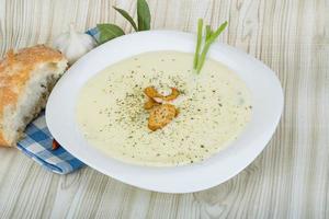 Cheese soup with croutons photo