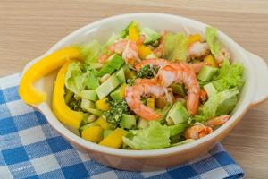 Salad with shrimps and avocado photo