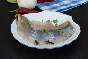 Herring fillet on the plate photo