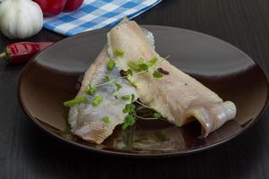 Herring fillet on the plate photo