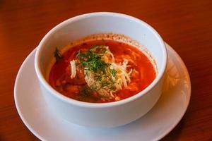 Tomato soup in the bowl photo