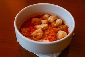 Tomato soup in the bowl photo