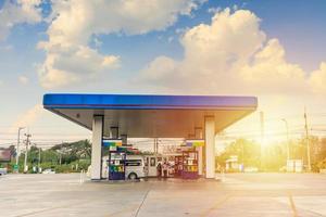 Petrol gas fuel station with clouds and blue sky photo